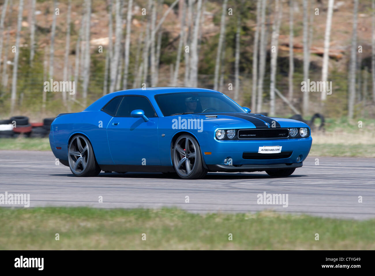 Blue Dodge Challenger on the race track Stock Photo