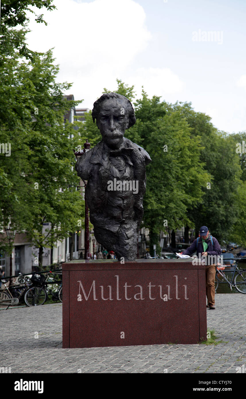 Multatuli Statue Statue of Multatuli on the square over the Singel canal in Amsterdam ...