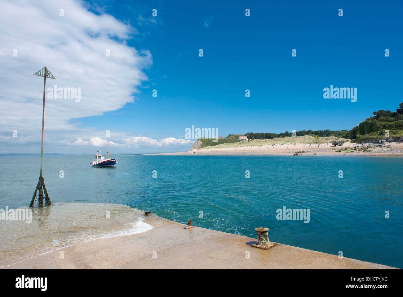 The ferry approaches Caldey Island, near Tenby, Pembrokeshire, Wales Stock Photo