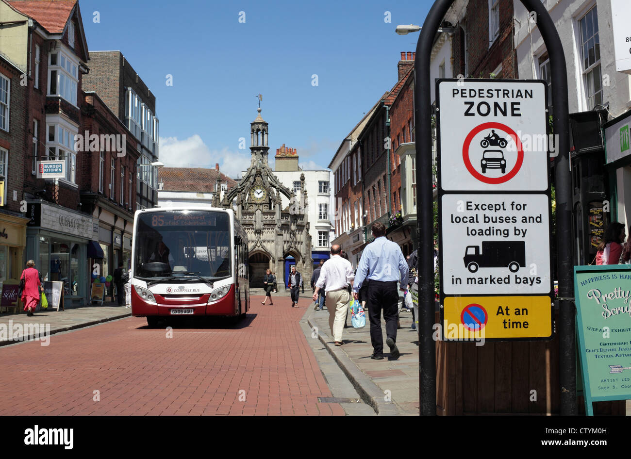 Road sign, South Street, Chichester town centre, restricting access to buses only. Chichester's Market Cross in the background. Stock Photo