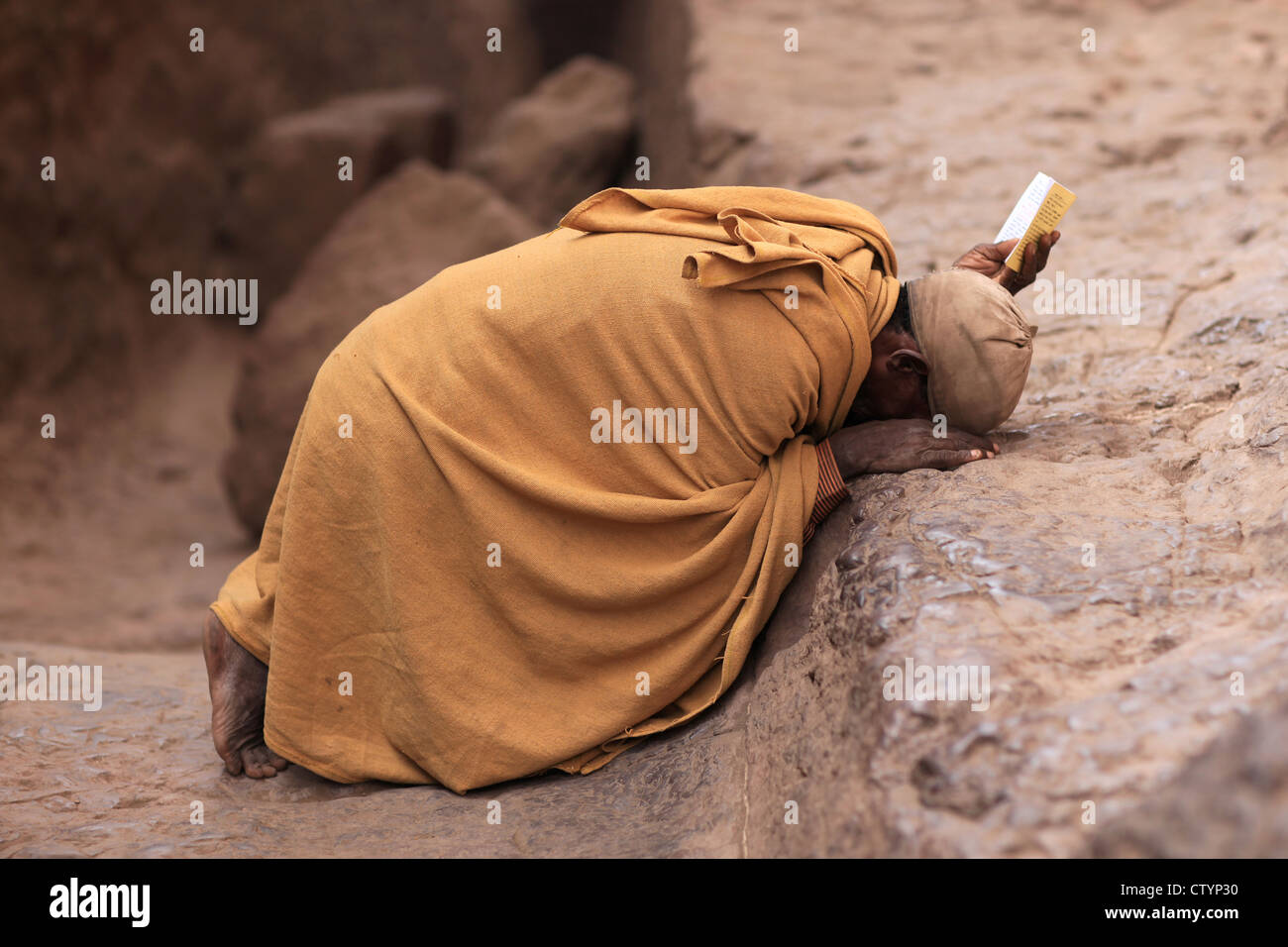 African christian priest praying Stock Photo