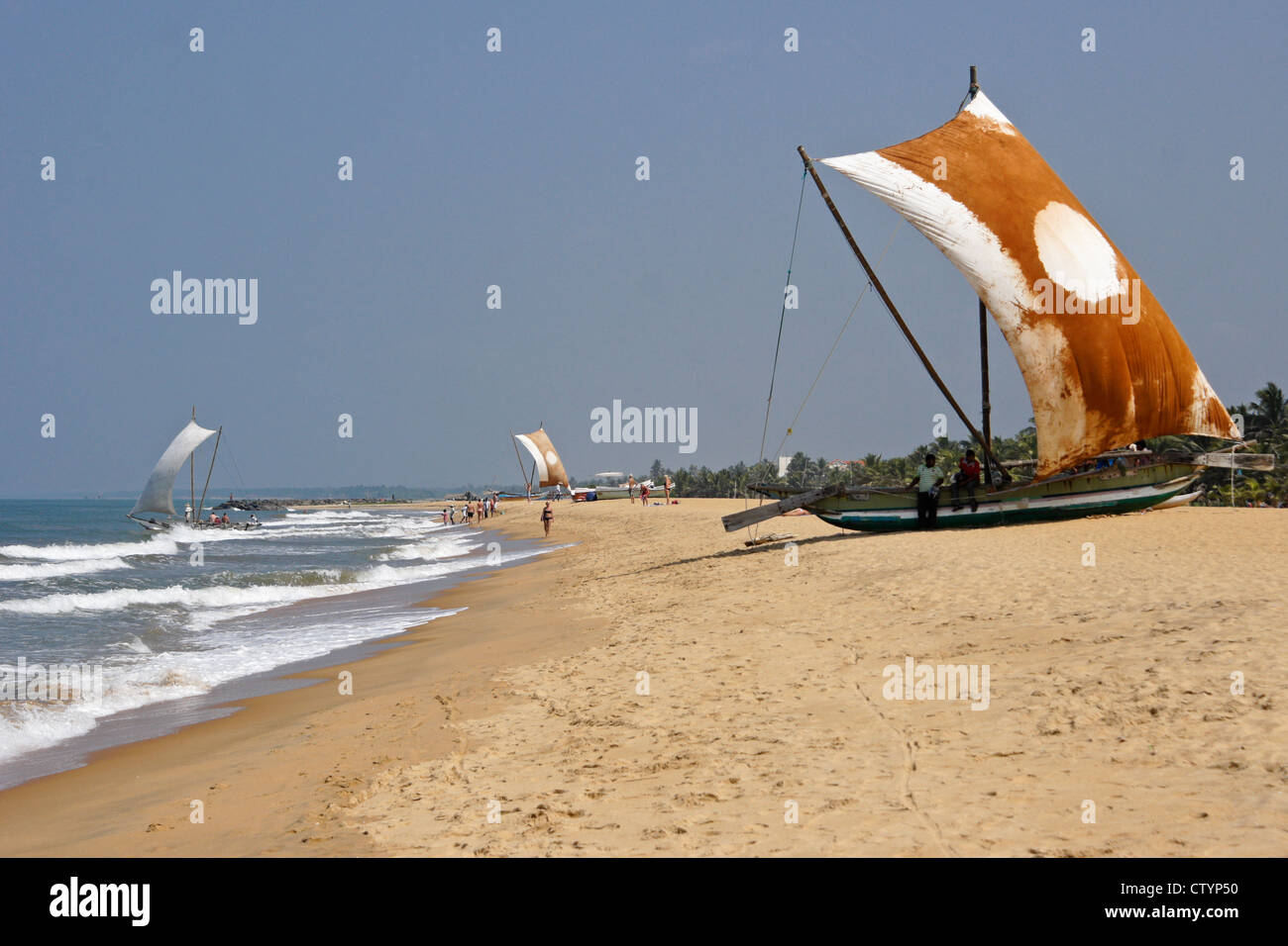 Outrigger fishing boats (oru) on beach, Negombo, Sri Lanka Stock Photo