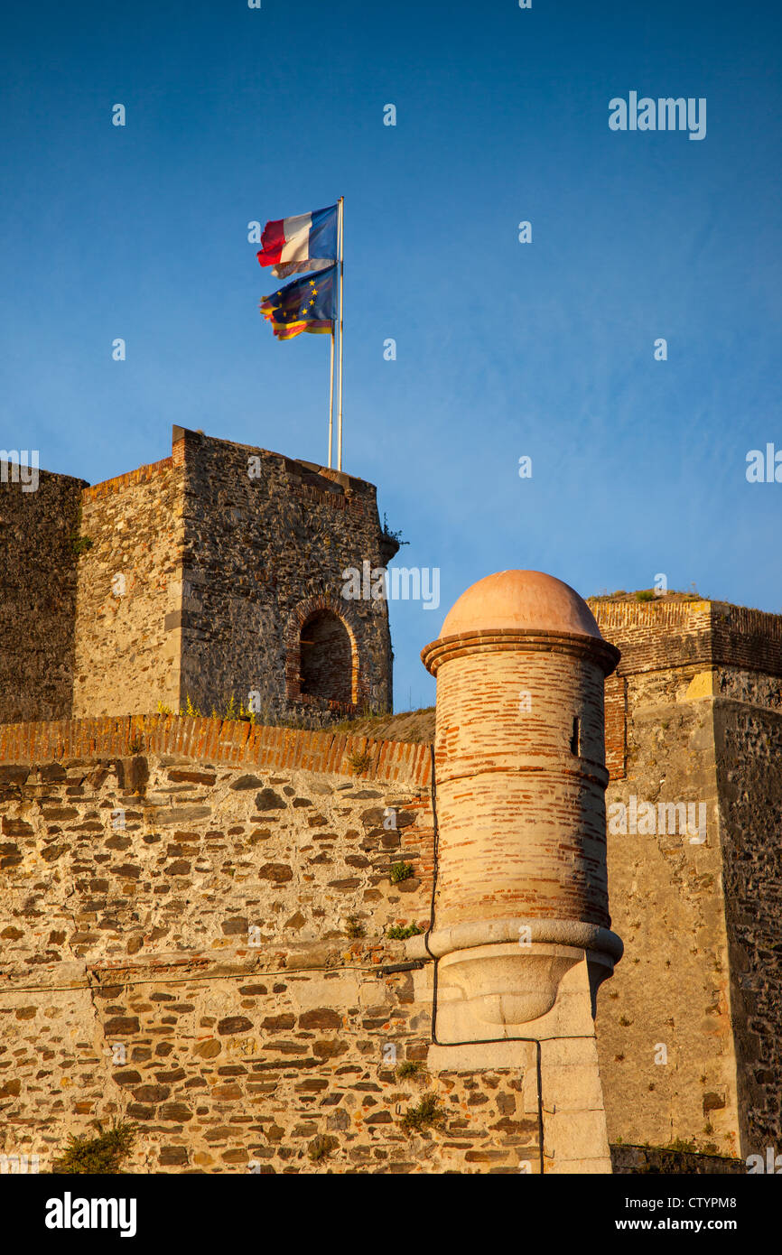 Flags fly above the Royal Castle and Fort, Collioure, Languedoc-Roussillon, France Stock Photo