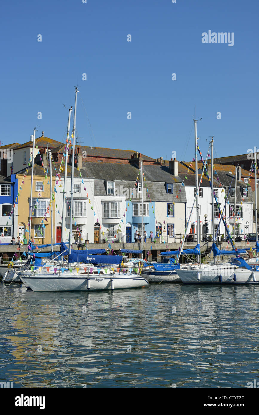 Colourful cottages in old harbour, Trinity Road, Weymouth, Dorset