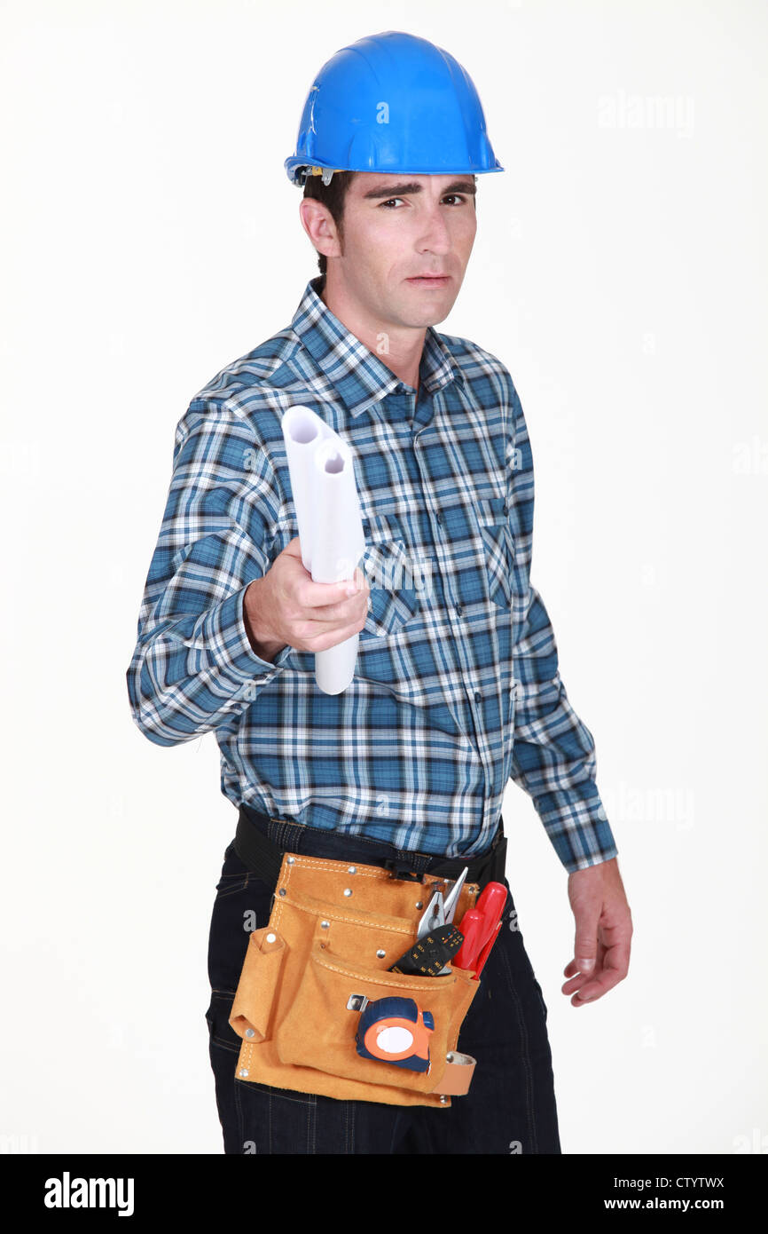 Filing Foreman foreman holding blueprints Stock Photo - Alamy