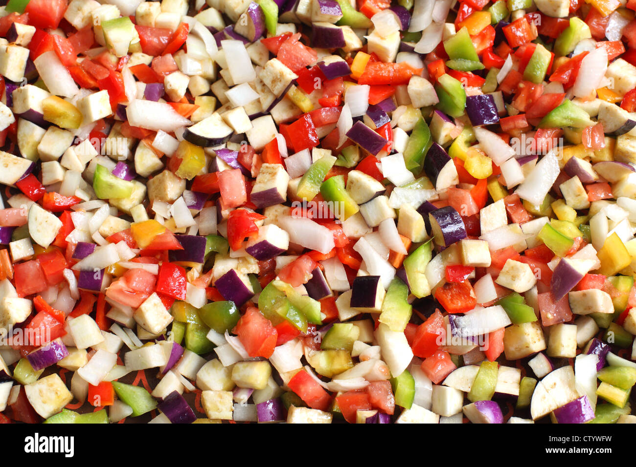 Chopped vegetables. Eggplant, peppers, onions, tomatoes. Stock Photo