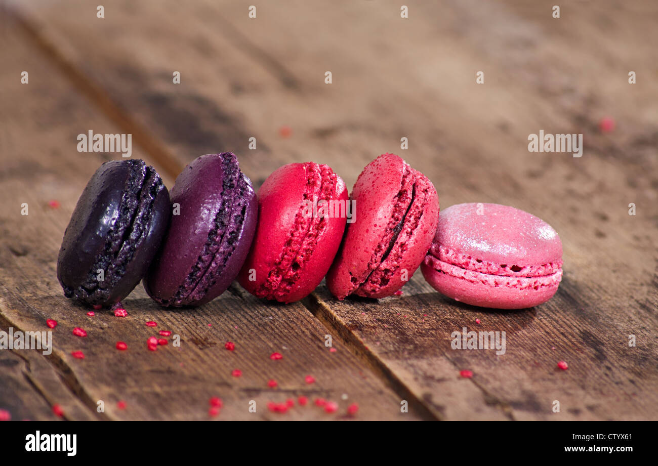 Macaroons on a wooden rustic table Stock Photo