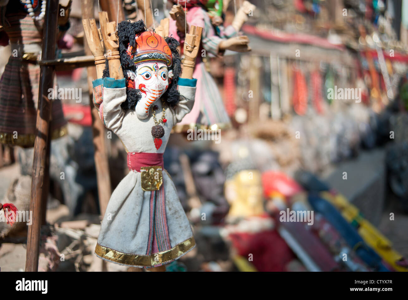 Masks, pottery,souvenirs, hanging in front of the shop, Bhaktapur, Nepal Stock Photo