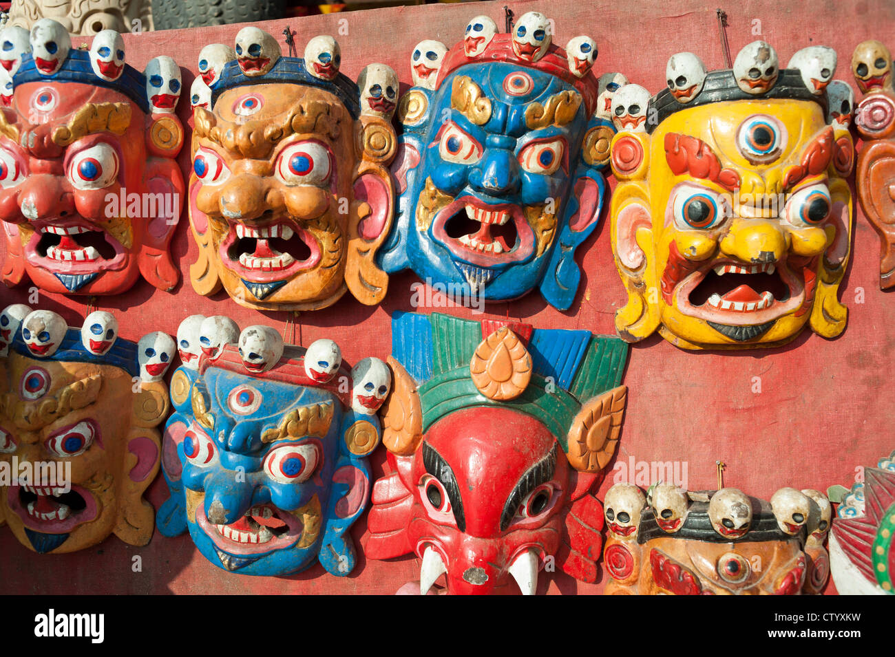 Masks, pottery,souvenirs, hanging in front of the shop, Bhaktapur, Nepal Stock Photo