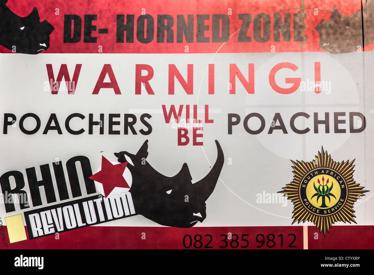 Anti-poaching warning sign, Hoedspruit, South Africa Stock Photo