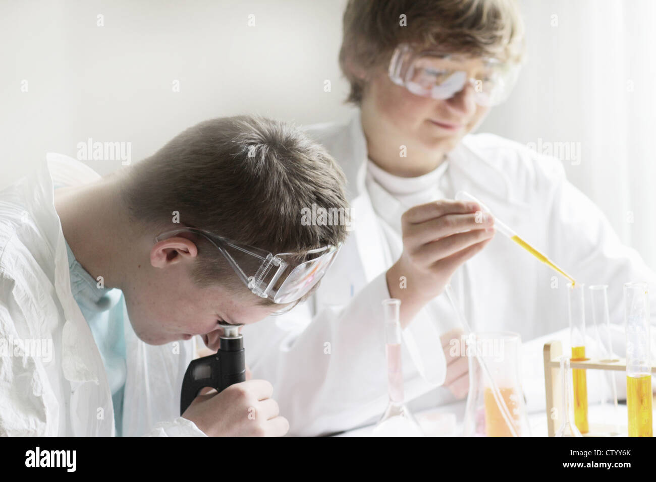 Students working in science lab Stock Photo Alamy