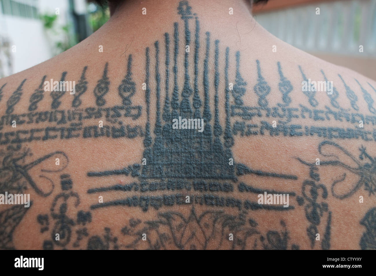 Sak Yan master,Ajahn Somchat of Nonthaburi of Thailand. Sak Yan are the mystical tattoos popular in Thailand. Stock Photo