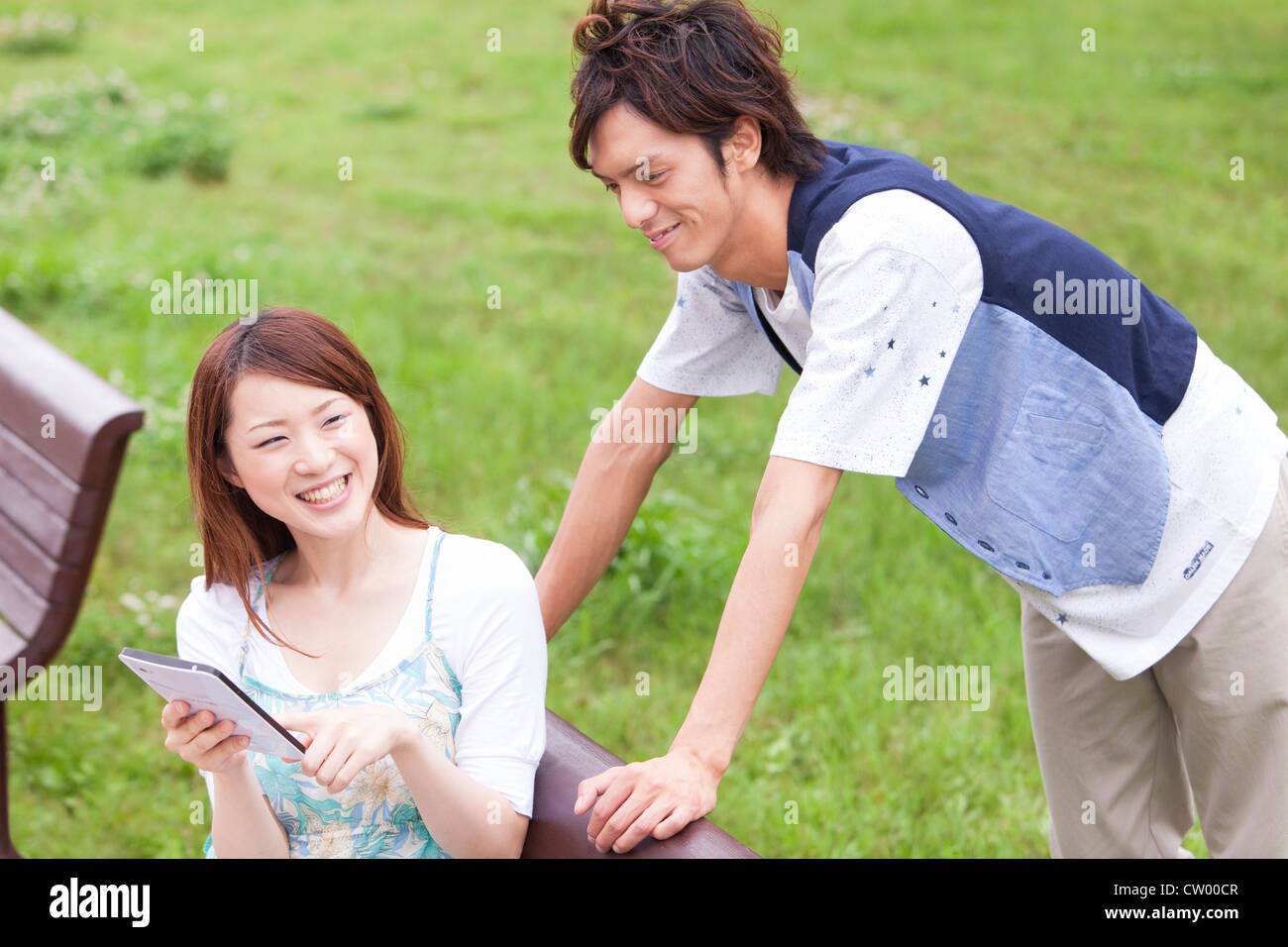 Two university students using tablet PC Stock Photo