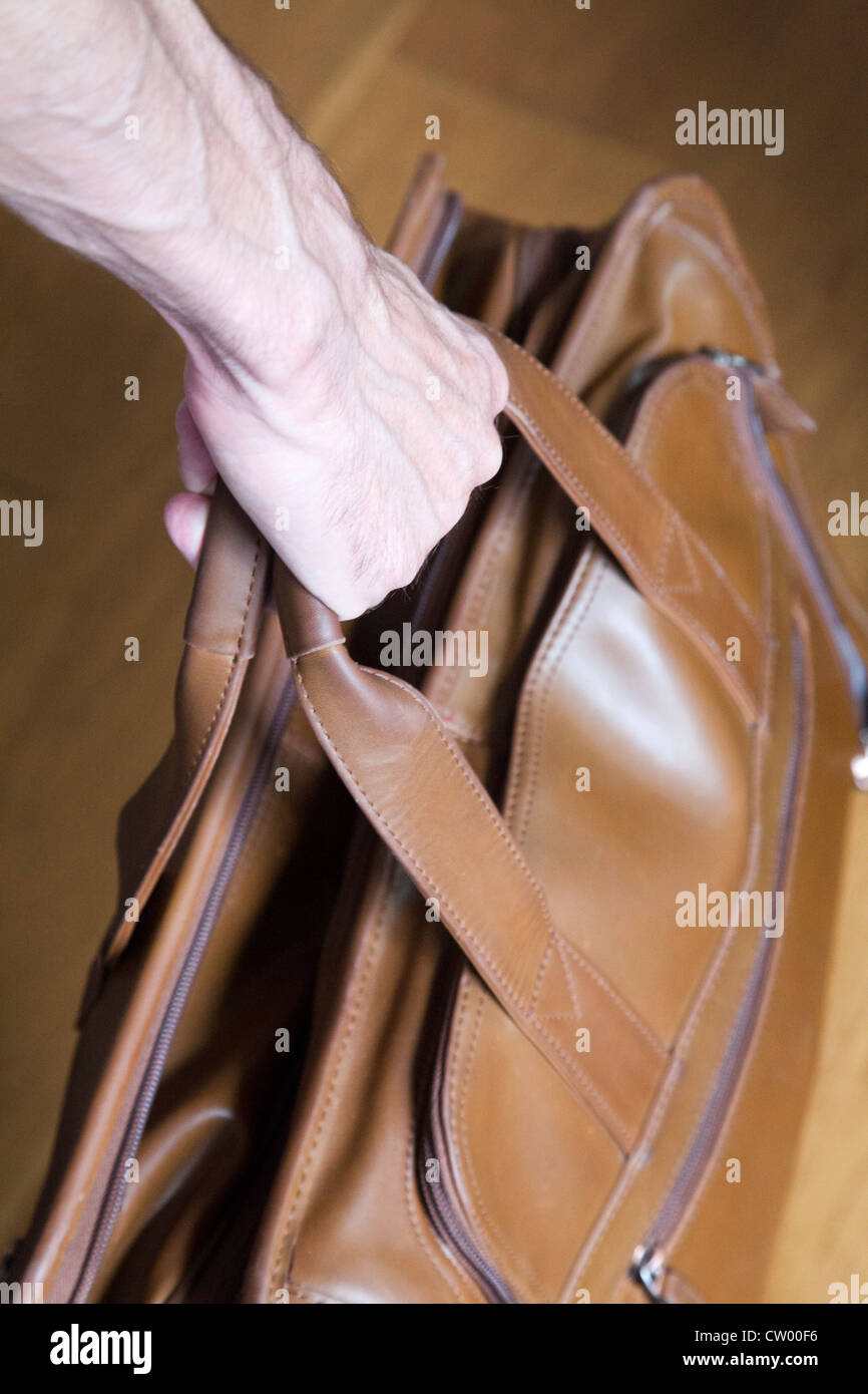 Man Carrying Leather Briefcase Stock Photo Alamy