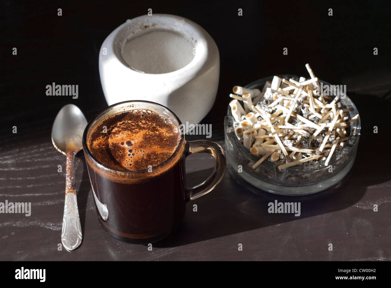 Coffee and cigarettes unhealthy habit in the morning Stock Photo