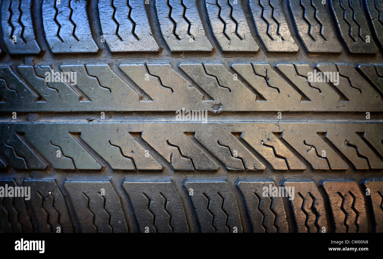 Old grunge tire closeup background texture Stock Photo