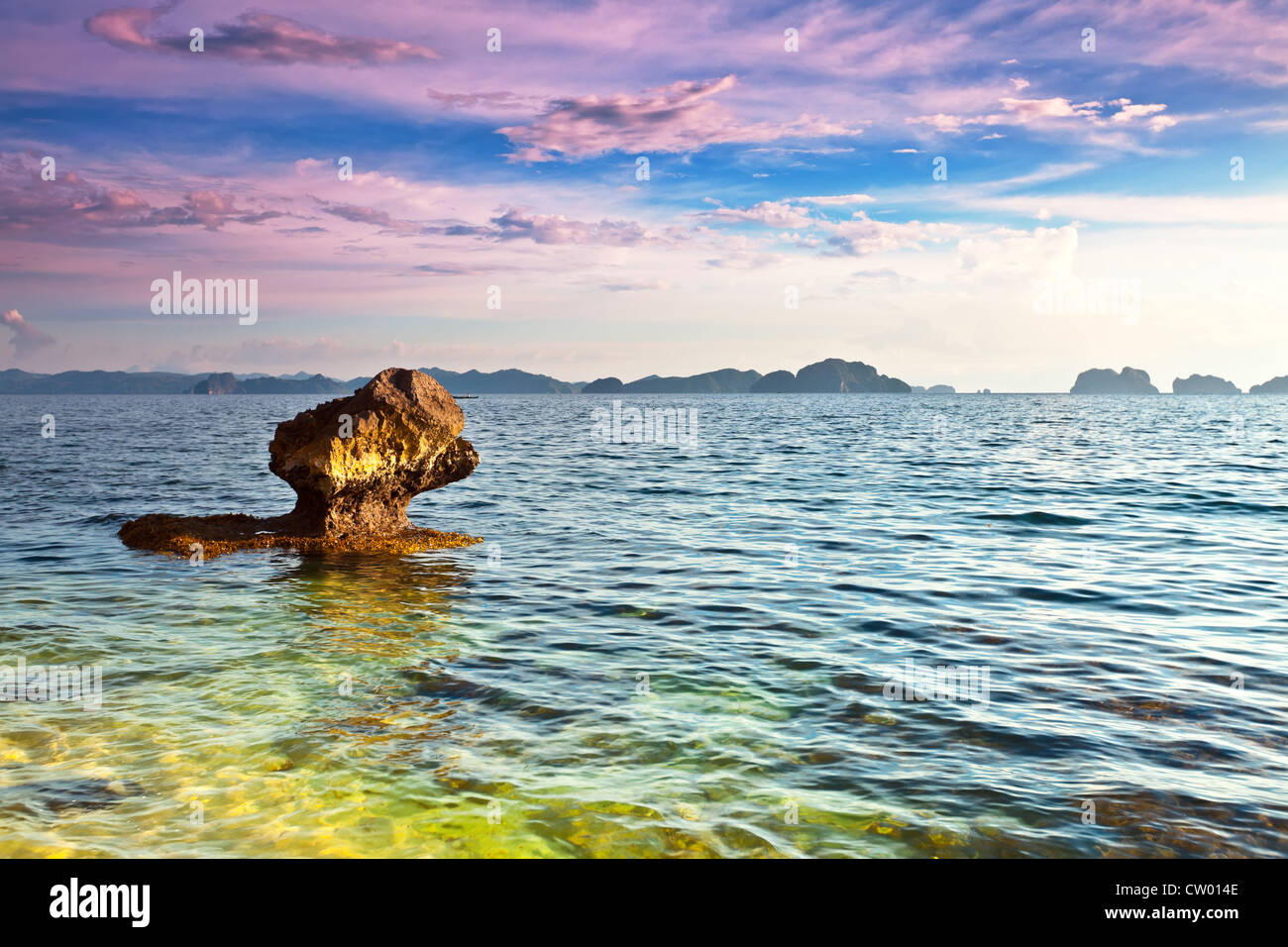 Beautiful seascape. Stone on the foreground. Philippines Stock Photo