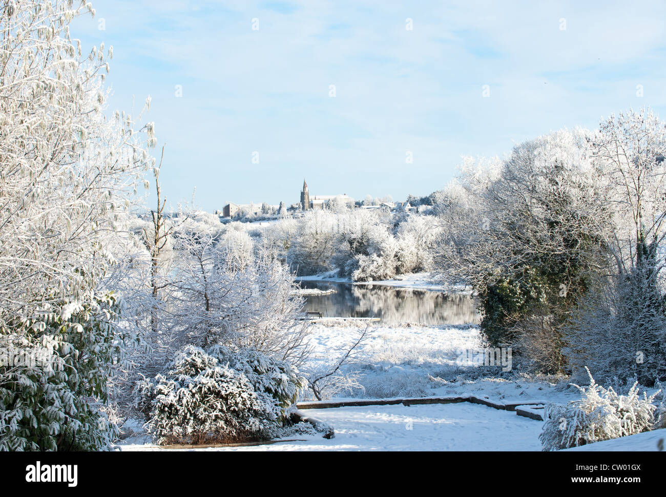 View on the river and town on the hill on the winter time Stock Photo