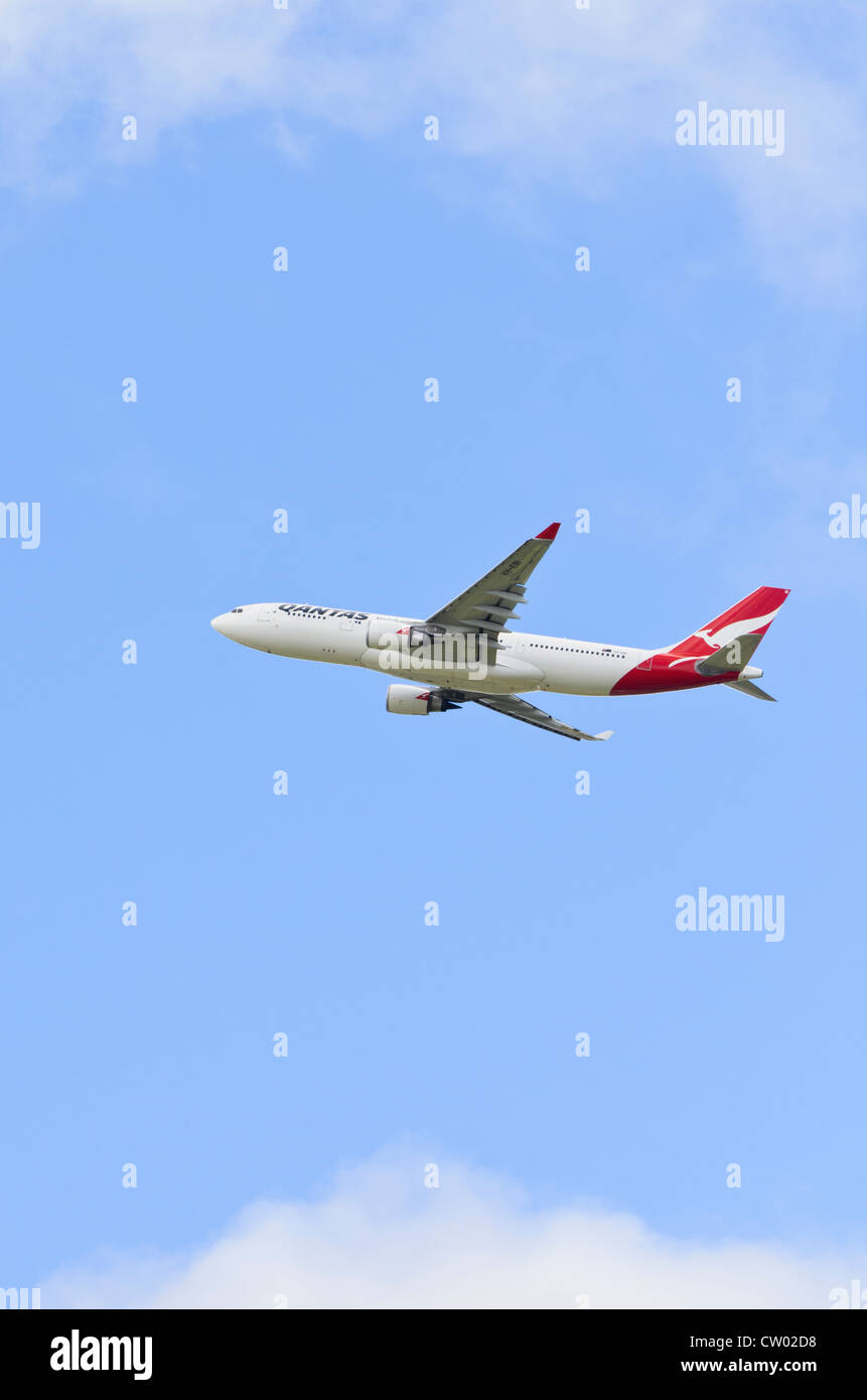 Qantas Airbus A330-202 in the sky above Australia Stock Photo