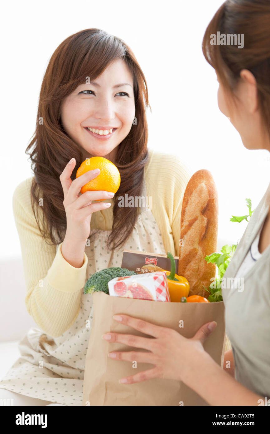 Two women talking sofa hi-res stock photography and images - Alamy