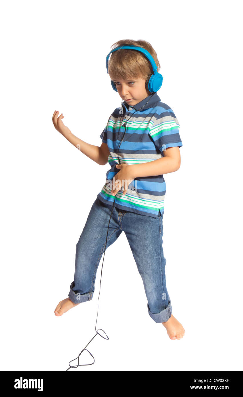 boy playing air guitar and dancing Stock Photo