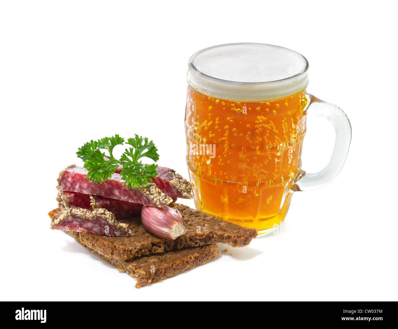 mug of beer and salami with parsley on a white background Stock Photo