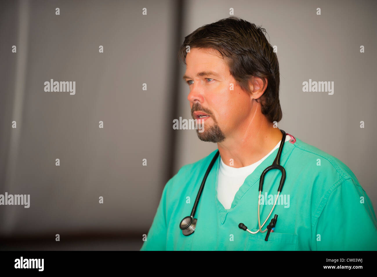 Male doctor, 51, in provisional clinic, Leakey, Texas, USA Stock Photo