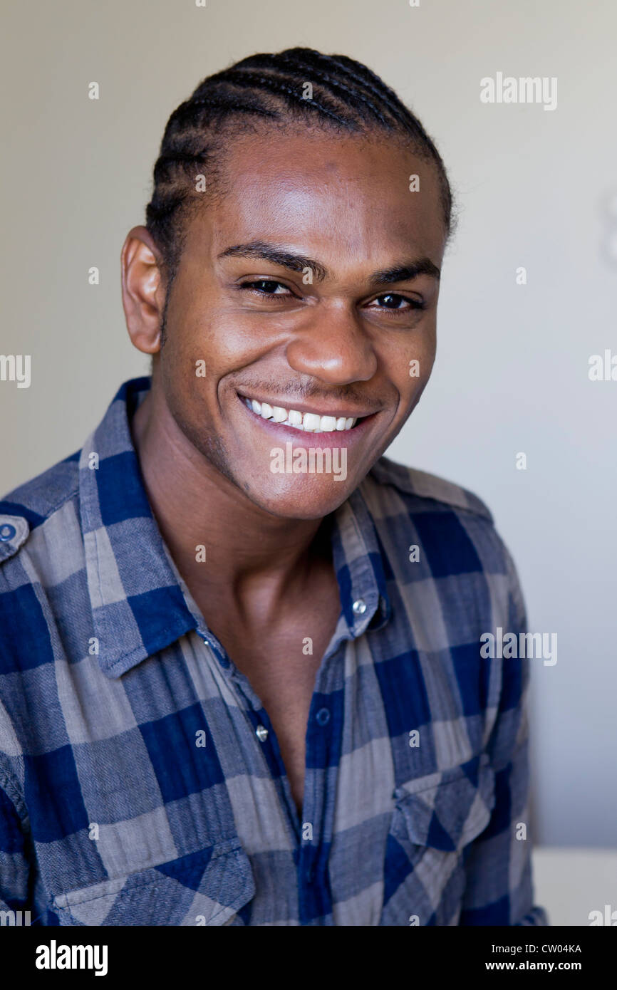 Closeup young mans face black hi-res stock photography and images - Alamy