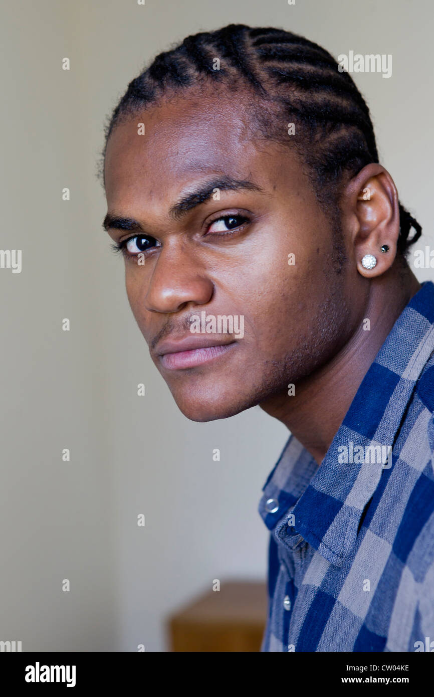 Closeup young mans face black hi-res stock photography and images - Alamy