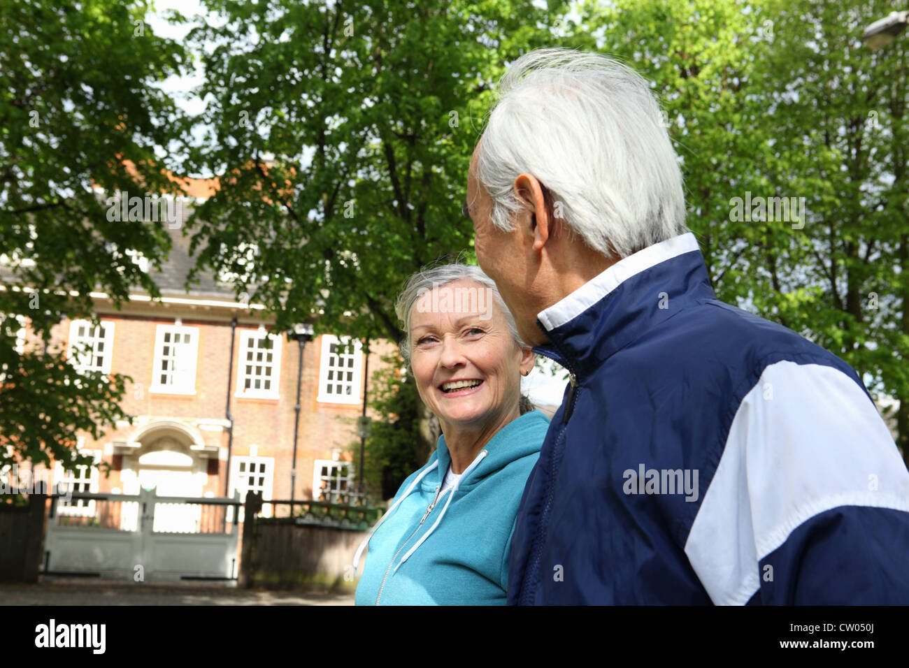 Older couple walking in park Stock Photo - Alamy