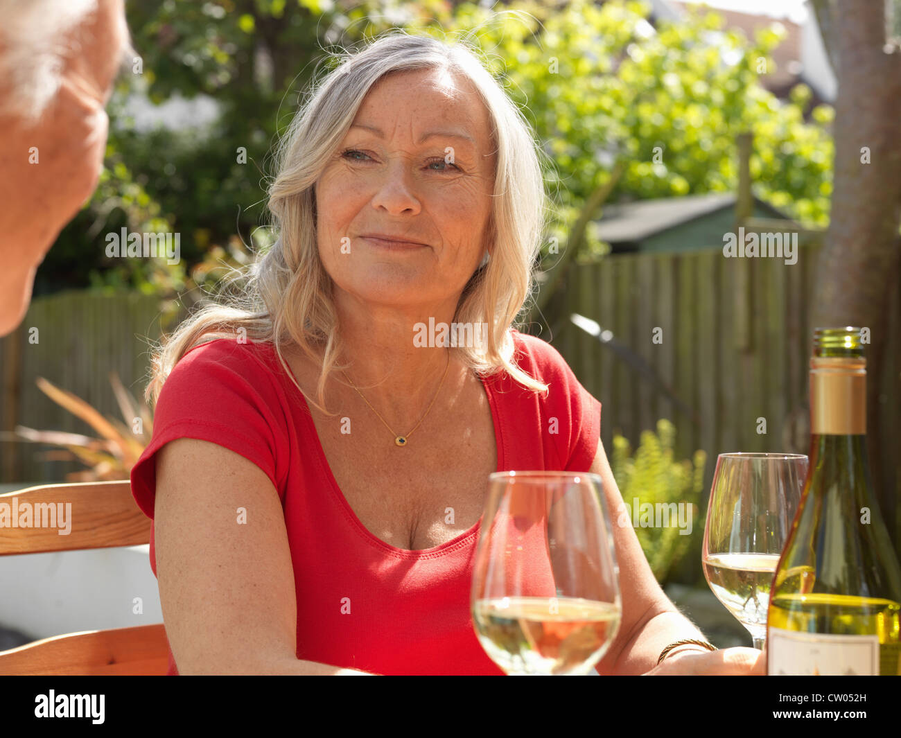 Older couple drinking wine together Stock Photo Alamy