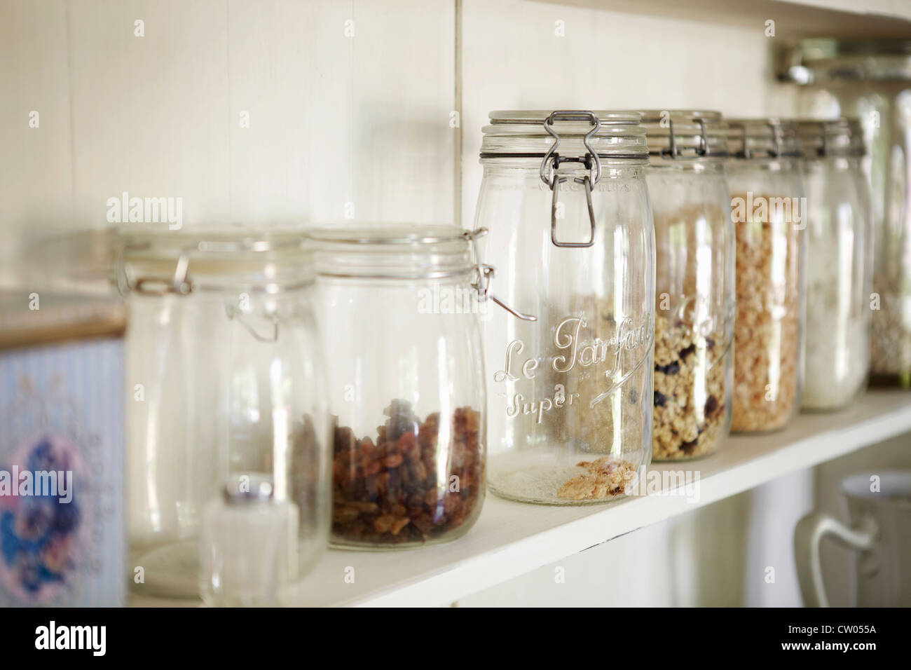 Jars of dried foods on shelf Stock Photo Alamy