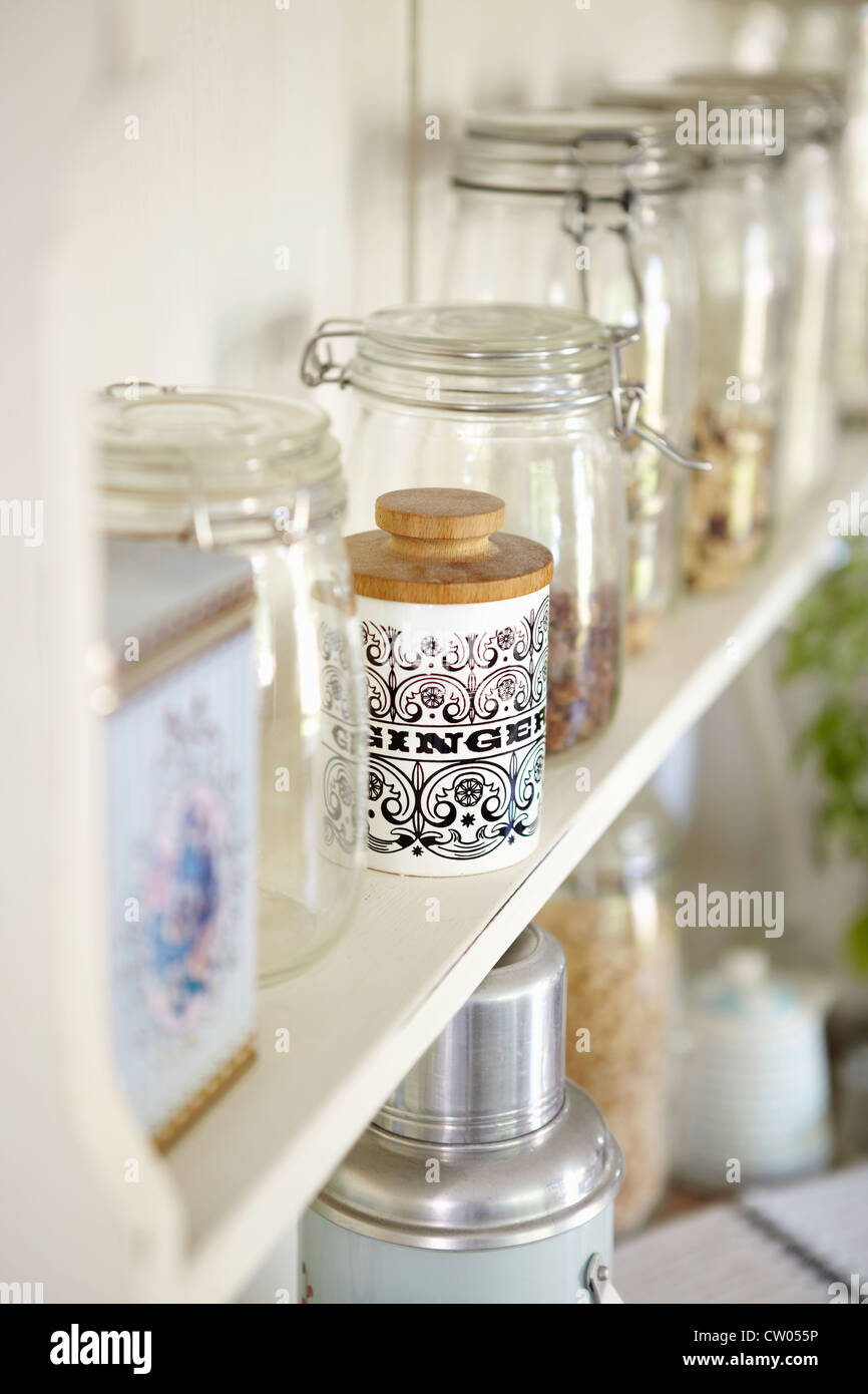 Jars of dried foods on shelf Stock Photo Alamy