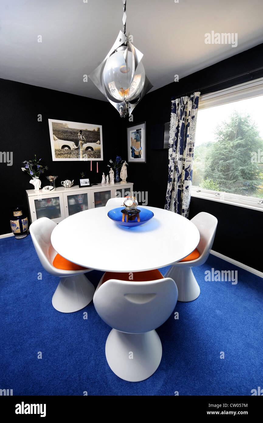 The dining room in a 1970's style house which was featured in a 1975 magazine makeover UK Stock Photo