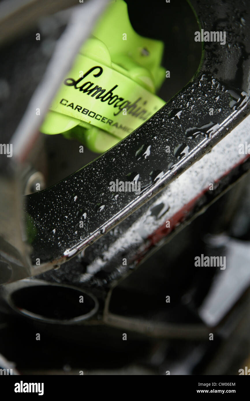 Green brake calipers on Aventador sportscar Stock Photo Alamy