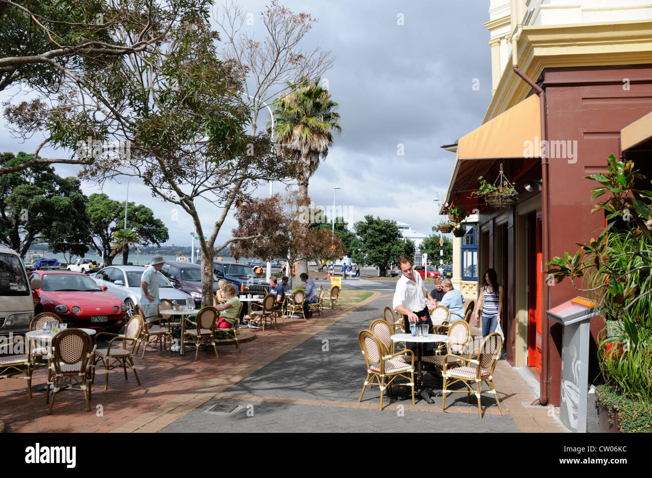 A busy cafe scene in Victoria Road, Devonport, Auckland in New Zealand
