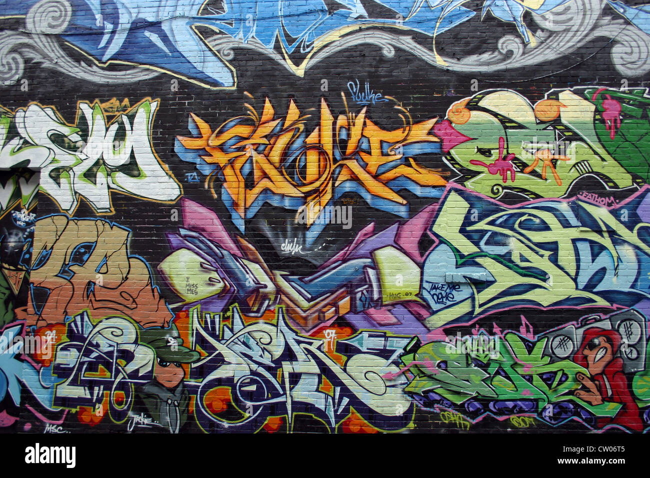 Painted graffiti on a building wall in Montreal, Quebec Stock Photo