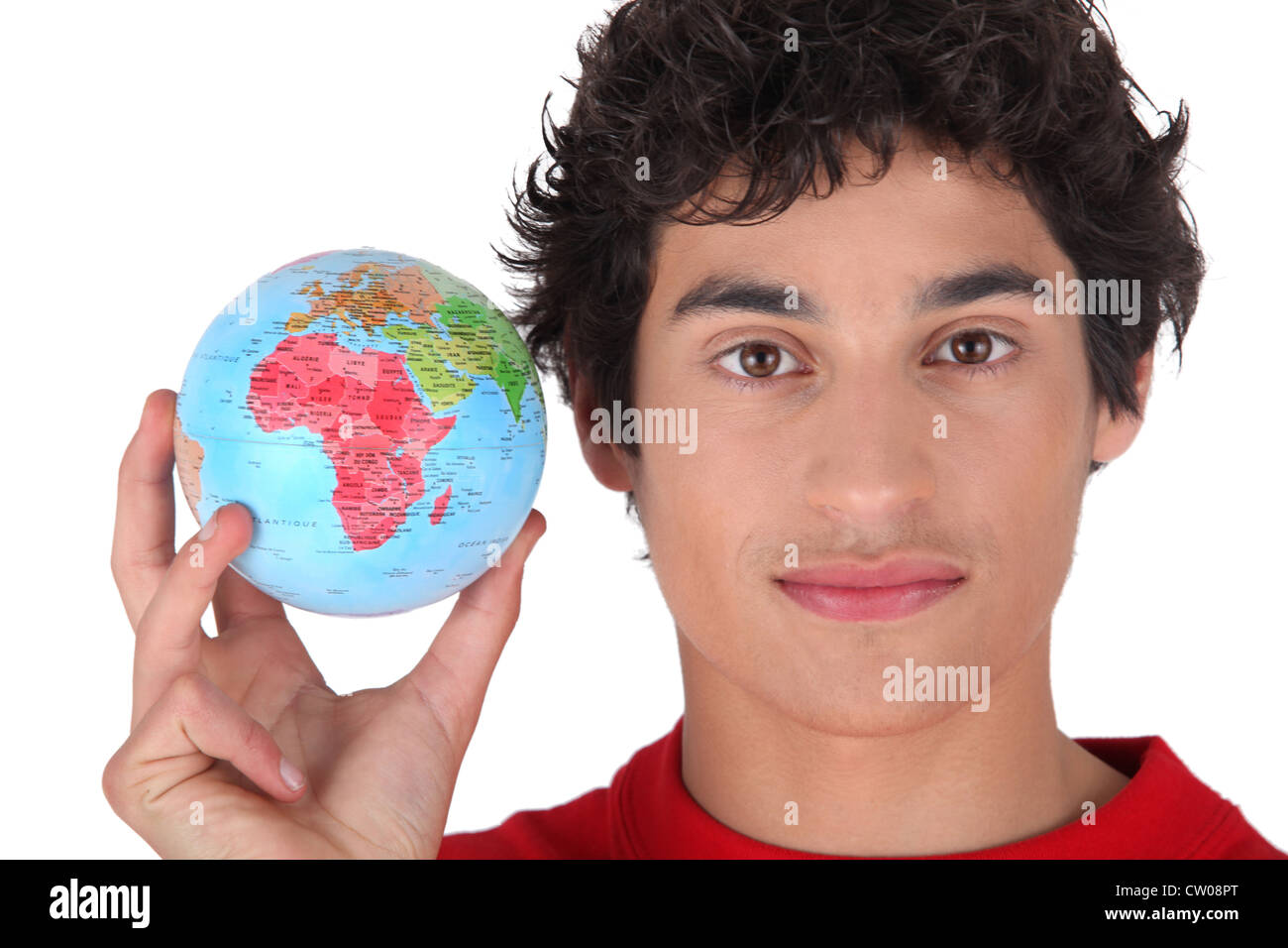 Young man holding a globe Stock Photo - Alamy