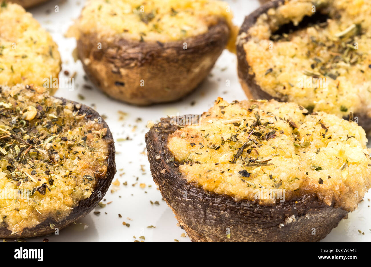 Portobello mushrooms stuffed with garlic, butter and herbs Stock Photo