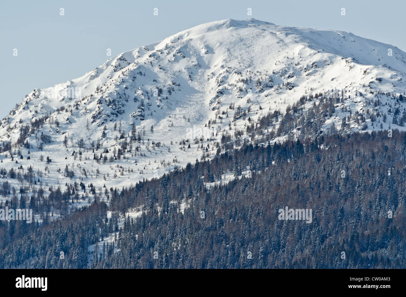 The snow capped alpine mountain of Gstoder, near Murau, Styria, Austria. Image taken from Freiberg near Ranten. Steiermark Stock Photo