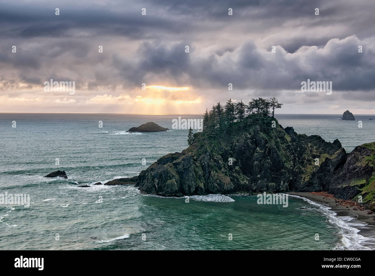 A brief clearing among the storm clouds at Oregon’s Boardman State Park and the south coastline of Curry County. Stock Photo