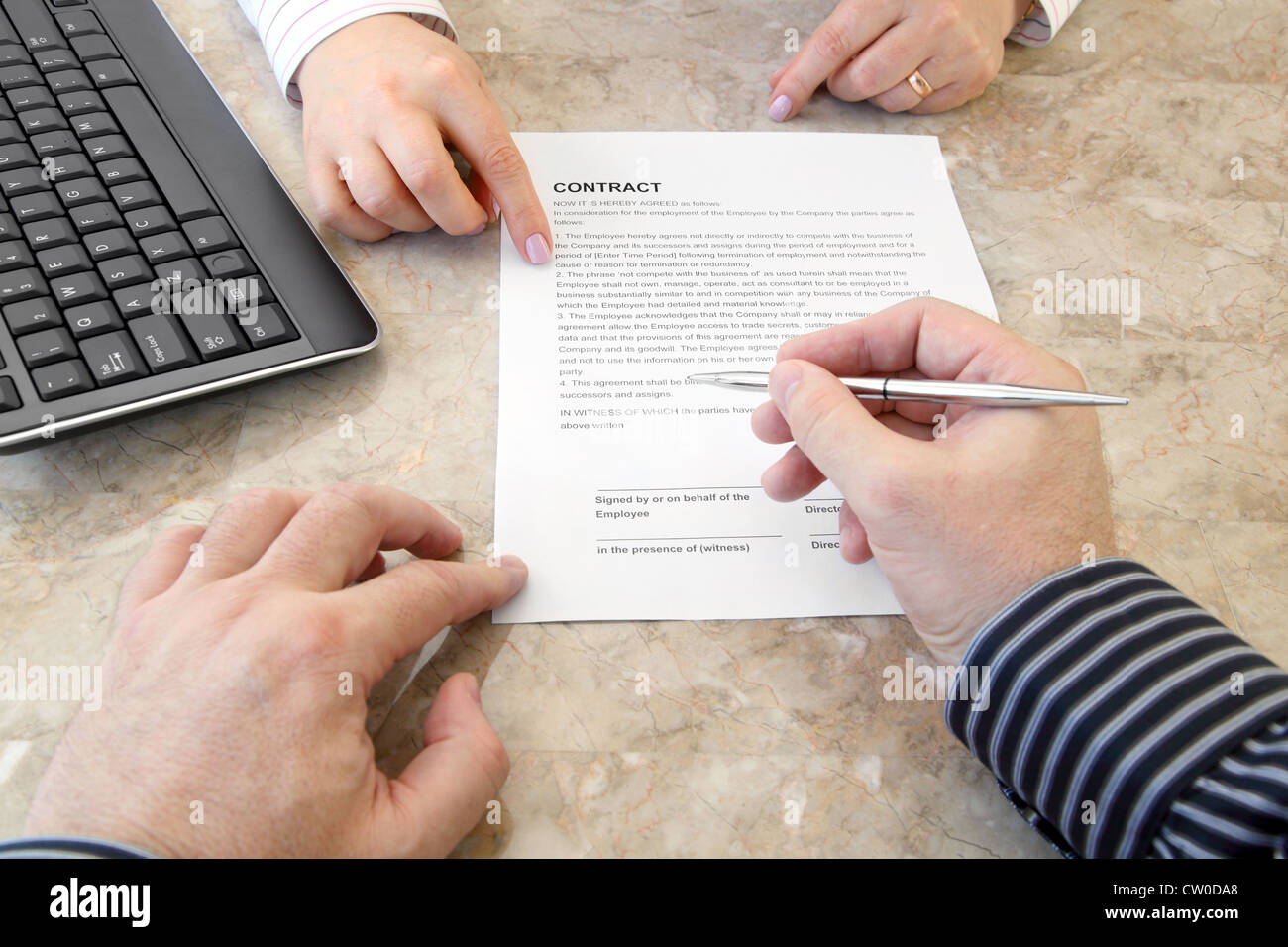 Signing a Contract Stock Photo
