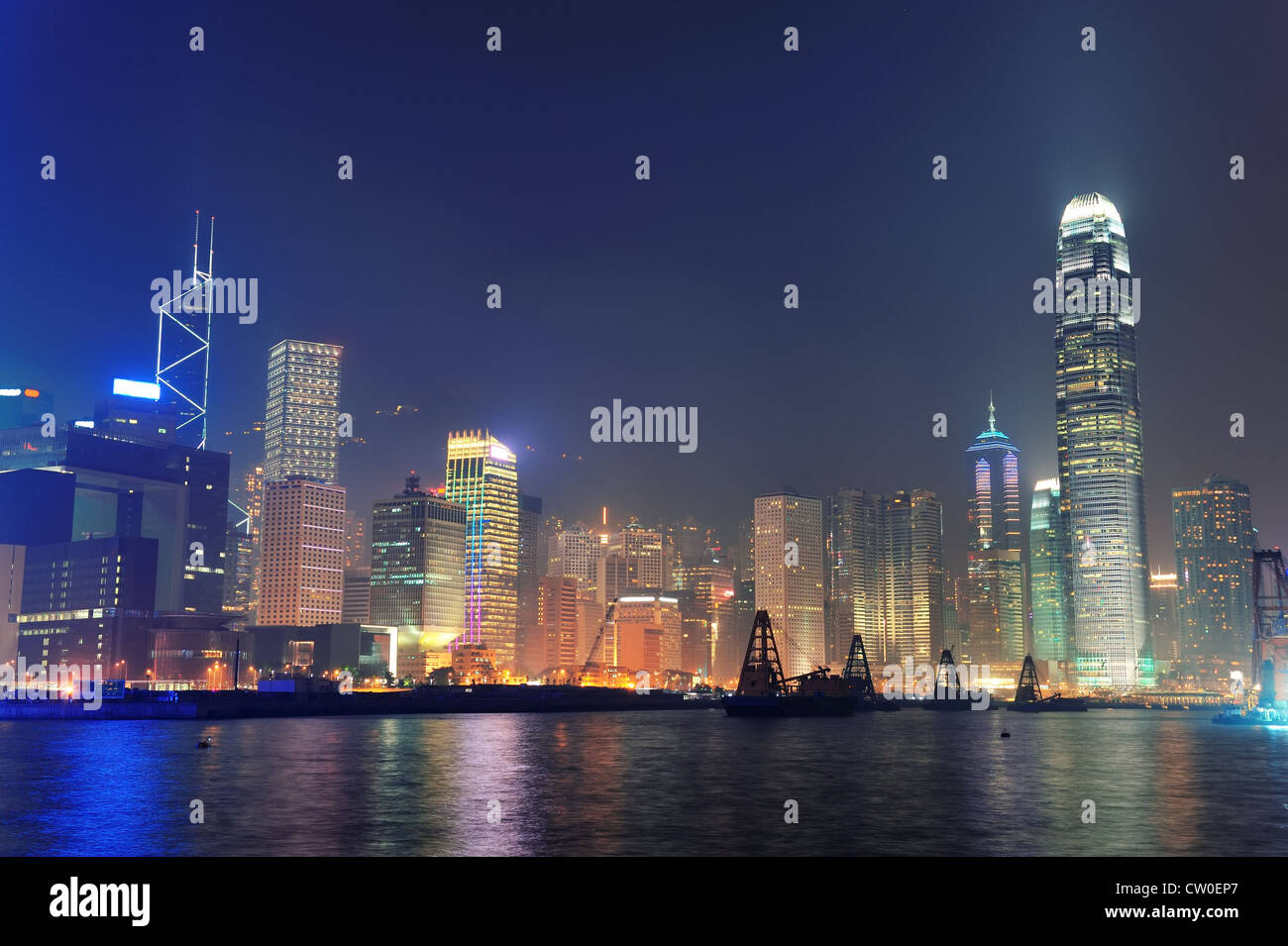 Hong Kong urban skyline panorama at night Stock Photo - Alamy