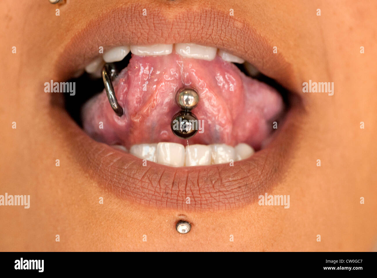 Tongue piercings hires stock photography and images Alamy