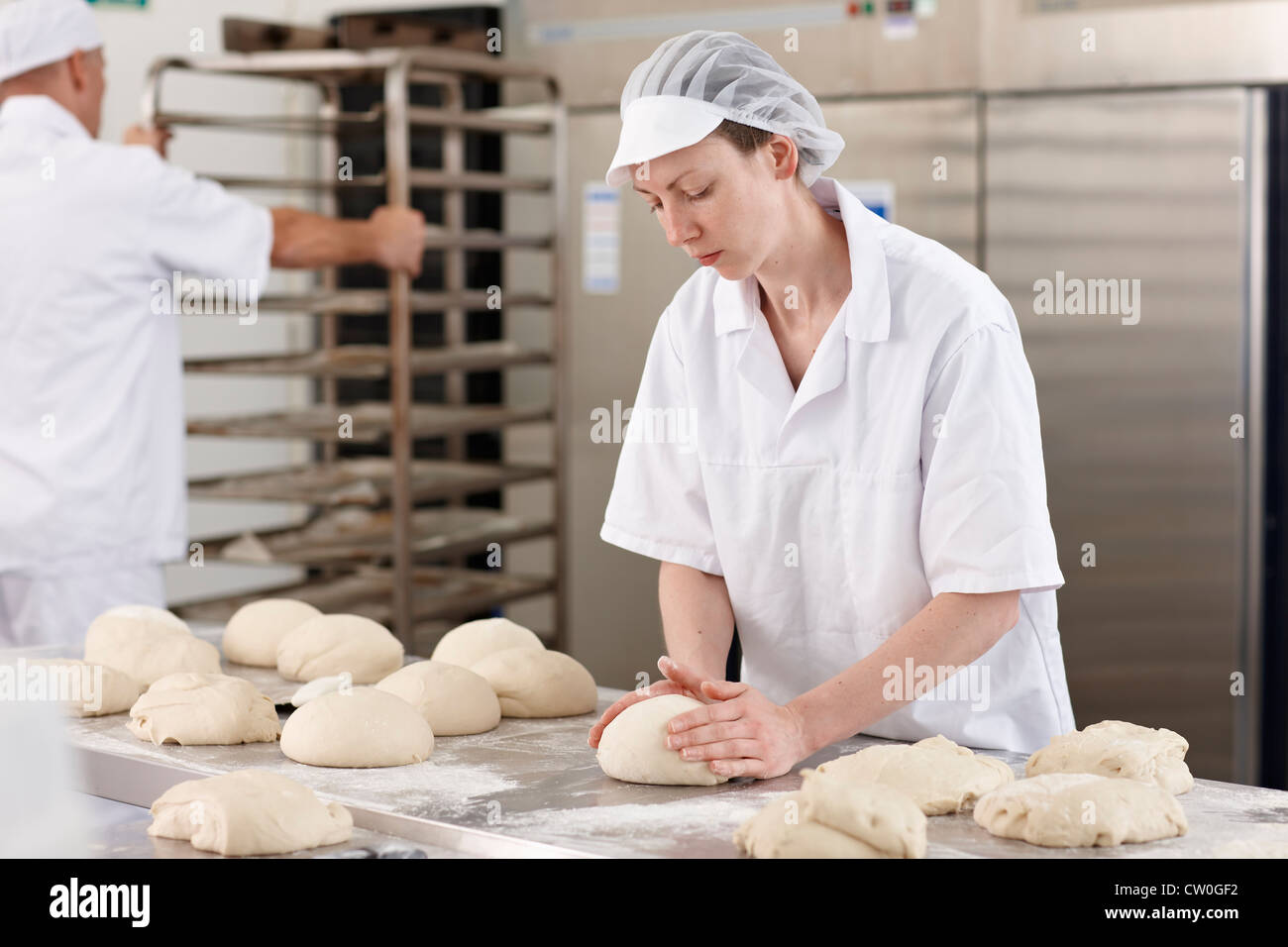 Chef baking in kitchen Stock Photo Alamy