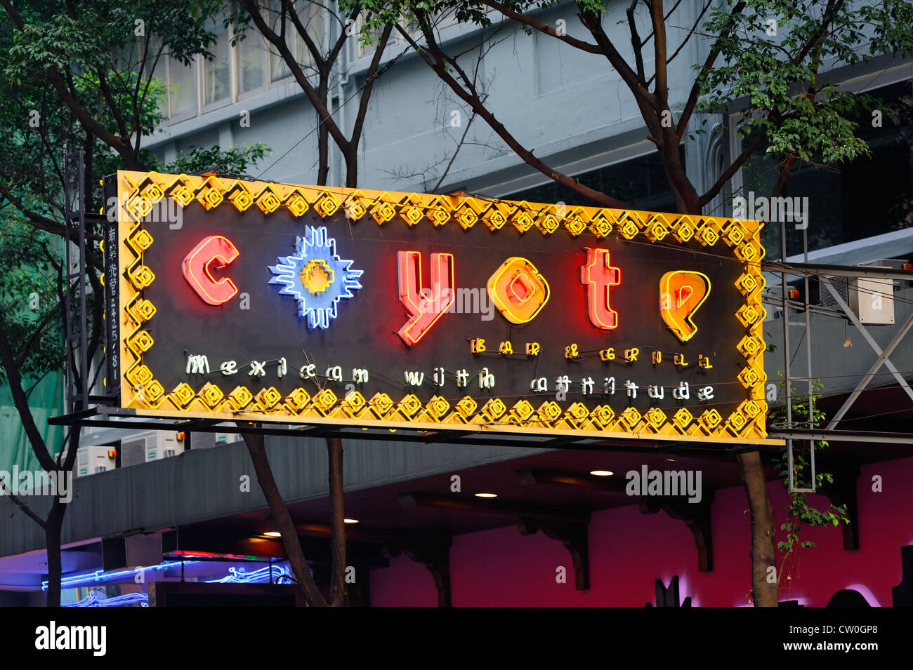 The Coyote Bar advertising across the road in Wan Chai, Hong Kong Stock  Photo - Alamy