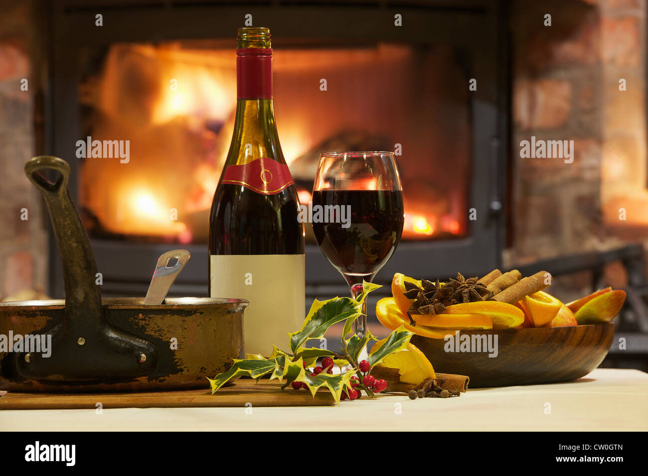 Mulled wine and spices at table Stock Photo