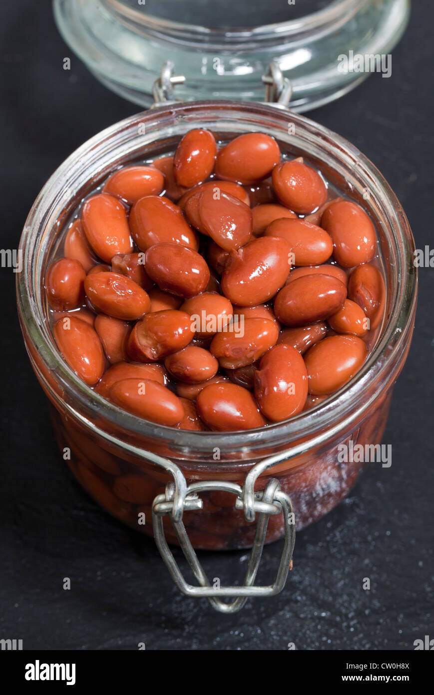borlotti beans in glass storage jar Stock Photo