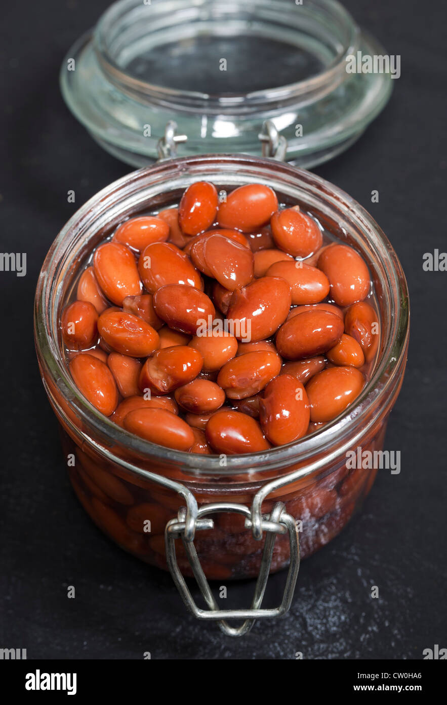 borlotti beans in glass storage jar Stock Photo