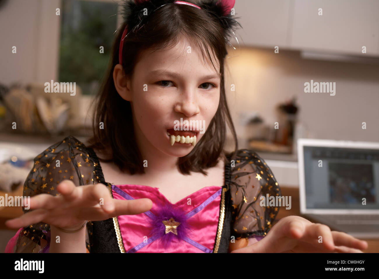 Girl wearing Halloween costume Stock Photo - Alamy